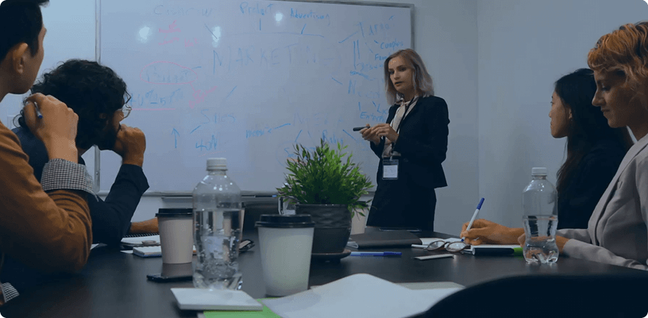Business meeting with professionals discussing AI-driven ERP solutions