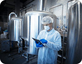 Person in a food processing facility