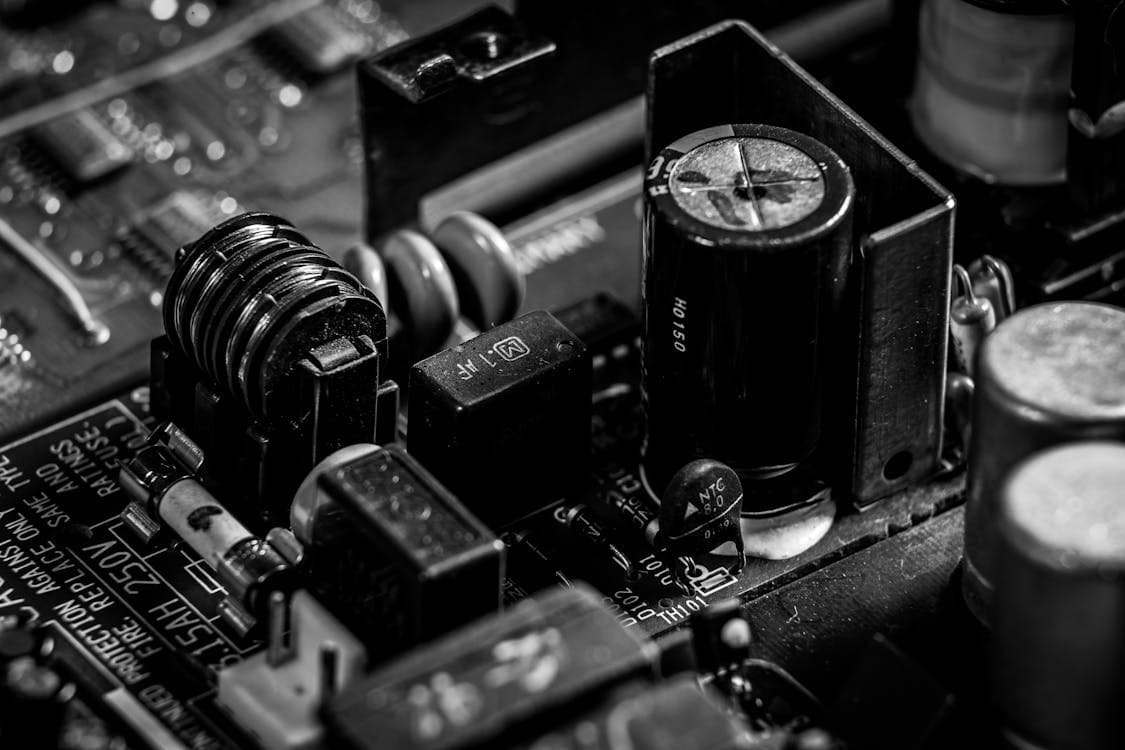 Semiconductor production planning dashboard showing fab, sort, assembly, and test phases