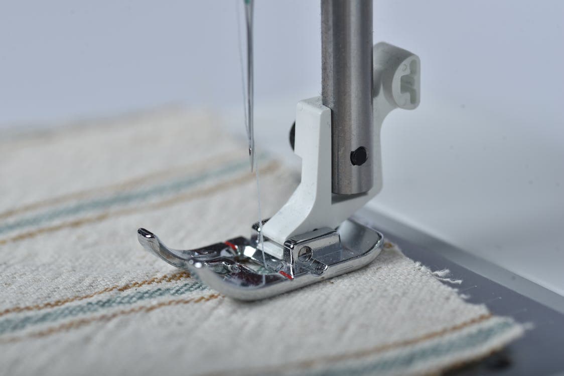 Textile order management dashboard showing order pipeline from inquiry through dispatch with status indicators